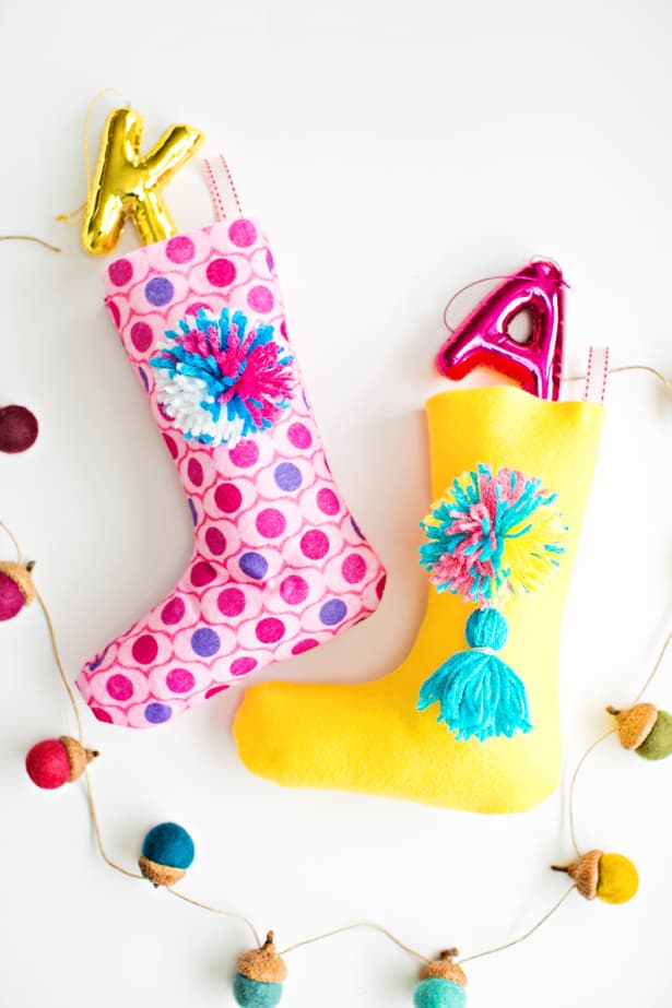 colorful felt Christmas stockings with pompoms