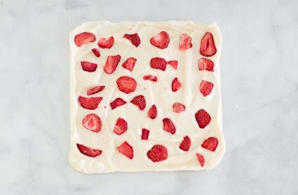 This simple strawberry frozen yogurt bark recipe makes a perfect quick snack or healthy dessert your kids will love.