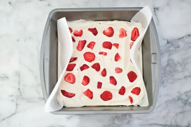 This simple strawberry frozen yogurt bark recipe makes a perfect quick snack or healthy dessert your kids will love.