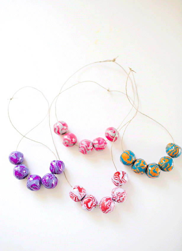 Wooden Beads on a String making a Colorful Toy Necklace Stock