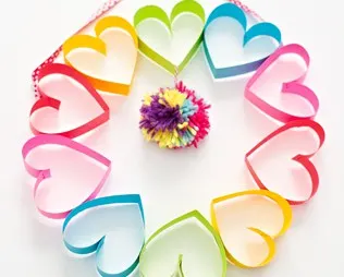 DIY RAINBOW PAPER HEART POM POM WREATH