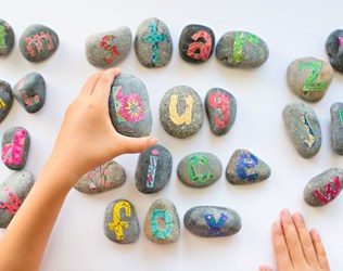 DIY ALPHABET ROCKS WITH FREE PRINTABLE LETTERS