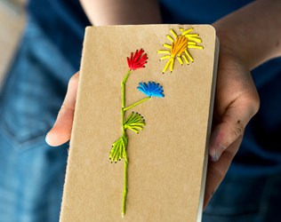 KID-MADE MOTHER’S DAY STITCHED NOTEBOOK