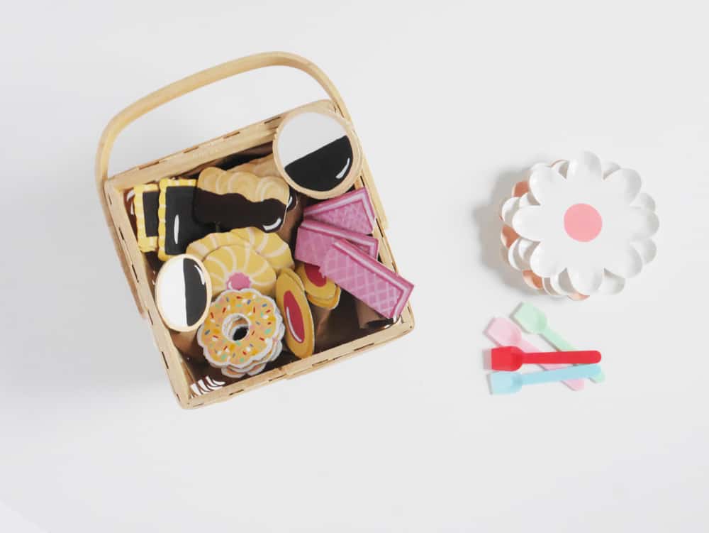 DIY your own set of adorable pretend play cookies from cardboard. A great recycled craft for kids!