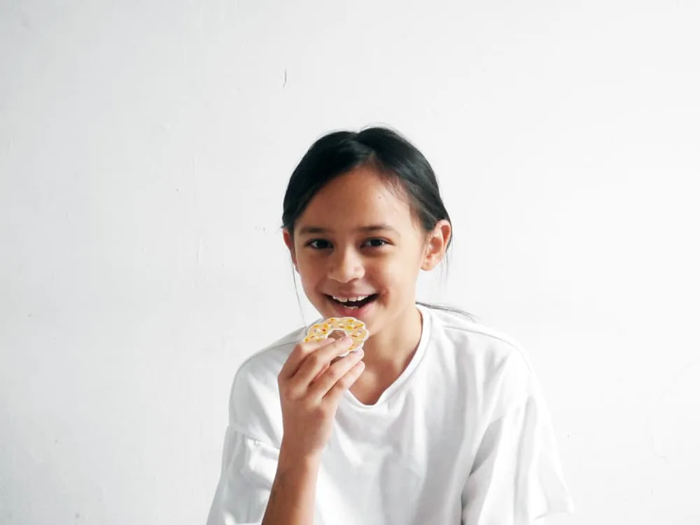 DIY your own set of adorable pretend play cookies from cardboard. A great recycled craft for kids!