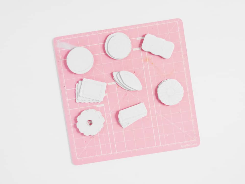 DIY your own set of adorable pretend play cookies from cardboard. A great recycled craft for kids!