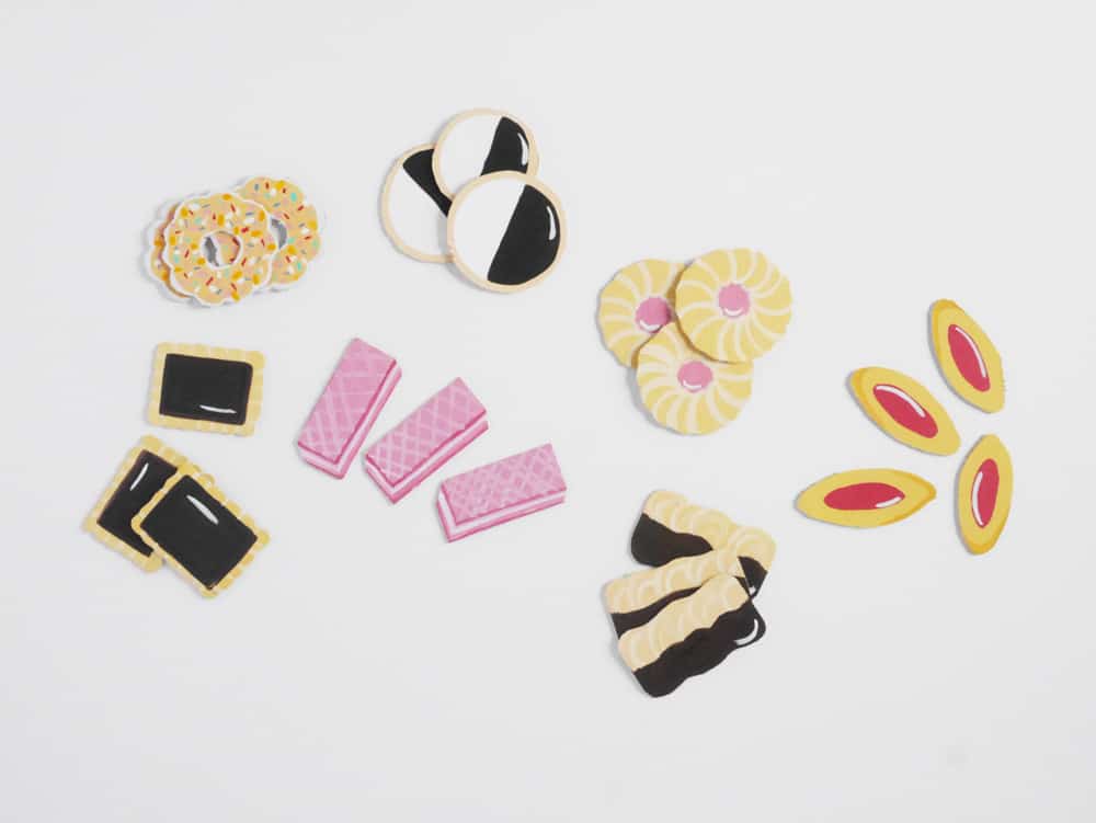 DIY your own set of adorable pretend play cookies from cardboard. A great recycled craft for kids!