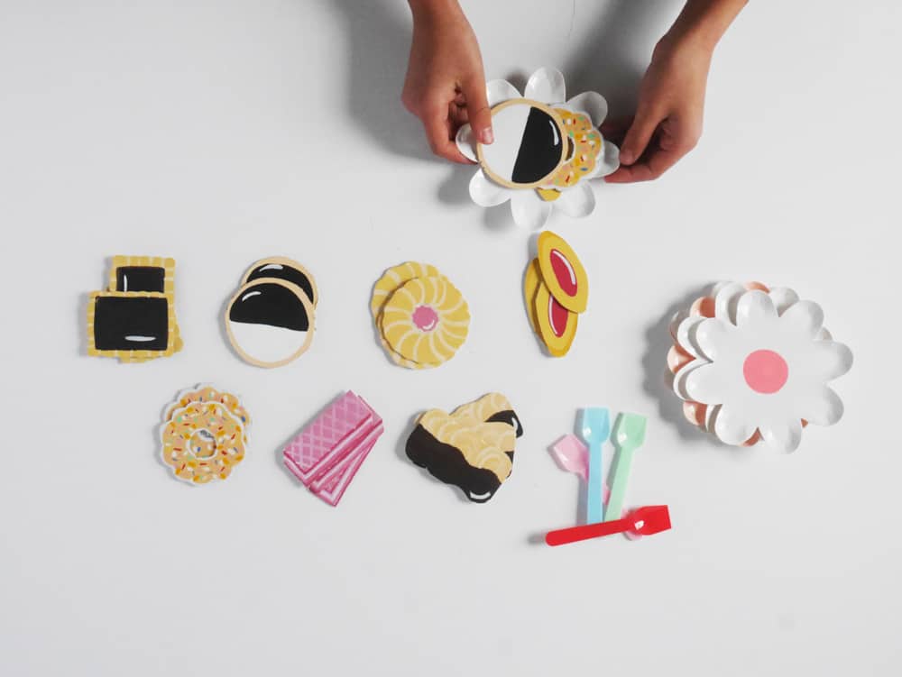 DIY your own set of adorable pretend play cookies from cardboard. A great recycled craft for kids!