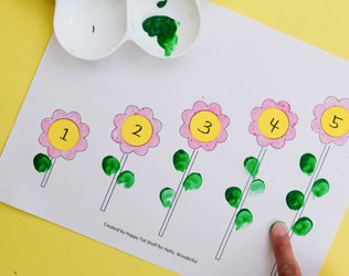 Turn color, number matching, counting and sequencing skills into a game with four fun flower activities for kids (with free printable template).