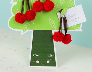 Create a DIY cherry tree message board with this cute free printable!