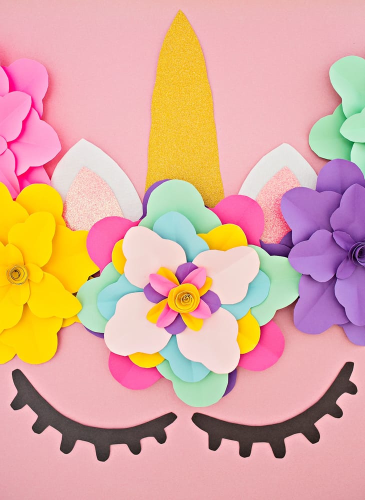 Create a beautiful and easy DIY unicorn flower backdrop for party decor!