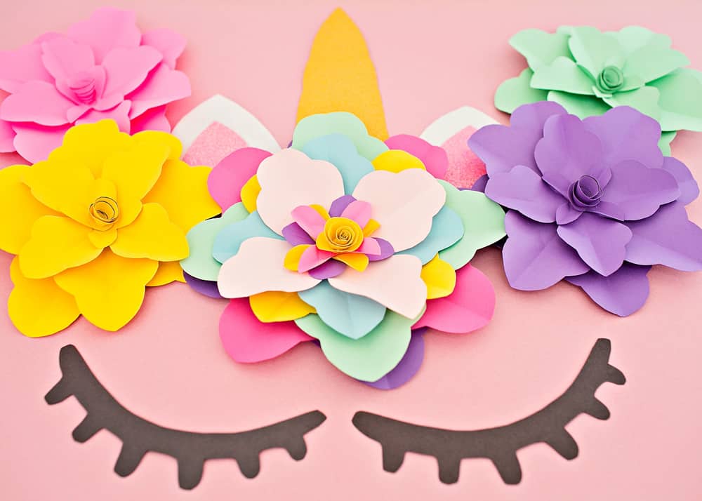 Create a beautiful and easy DIY unicorn flower backdrop for party decor!