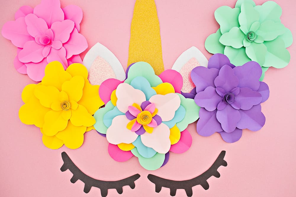 Create a beautiful and easy DIY unicorn flower backdrop for party decor!