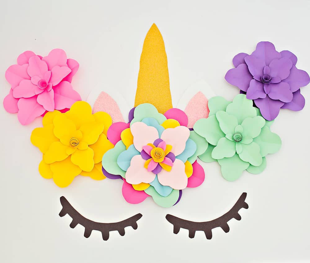 Create a beautiful and easy DIY unicorn flower backdrop for party decor!