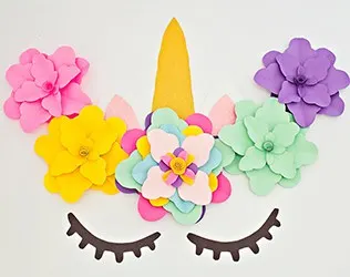 Create a beautiful and easy DIY unicorn flower backdrop for party decor!