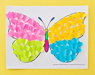 Make a cute summer butterfly craft from cut-out hearts!