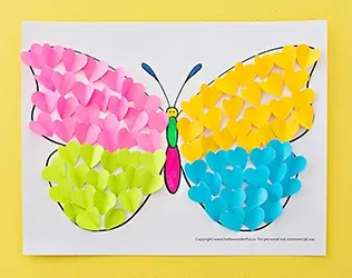 Make a cute summer butterfly craft from cut-out hearts!