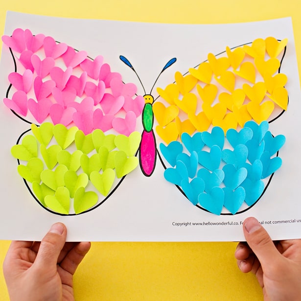 hands holding BUTTERFLY PAPER HEART CRAFT