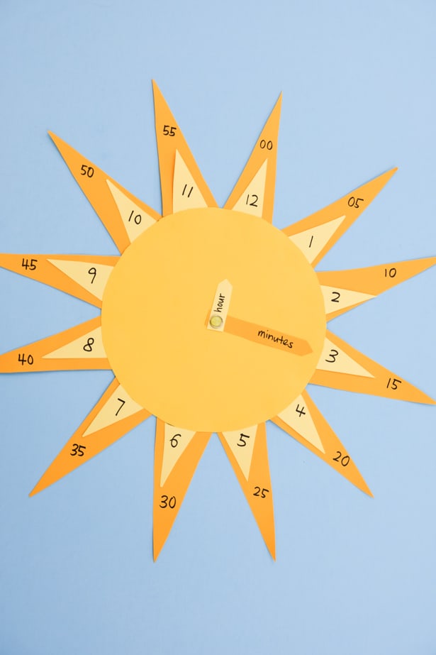 Teach your little ones how to tell time with this cute DIY sun clock craft and learning tool!