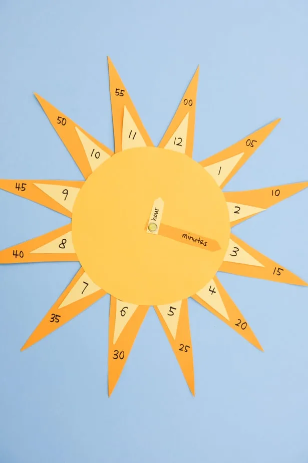 Teach your little ones how to tell time with this cute DIY sun clock craft and learning tool!