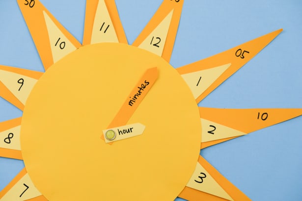 Teach your little ones how to tell time with this cute DIY sun clock craft and learning tool!