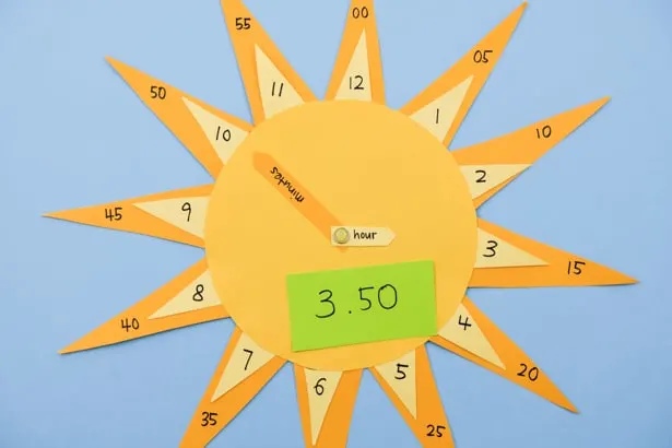 Teach your little ones how to tell time with this cute DIY sun clock craft and learning tool!