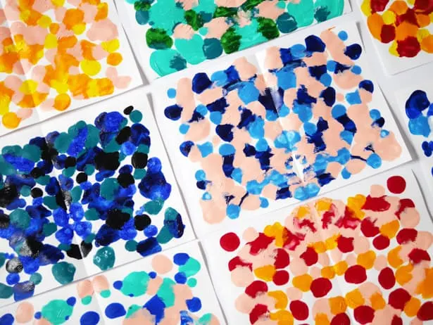 Easy and beautiful paint dot symmetry art for kids!