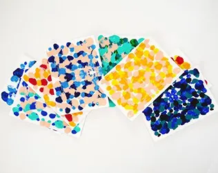 Easy and beautiful paint dot symmetry art for kids!