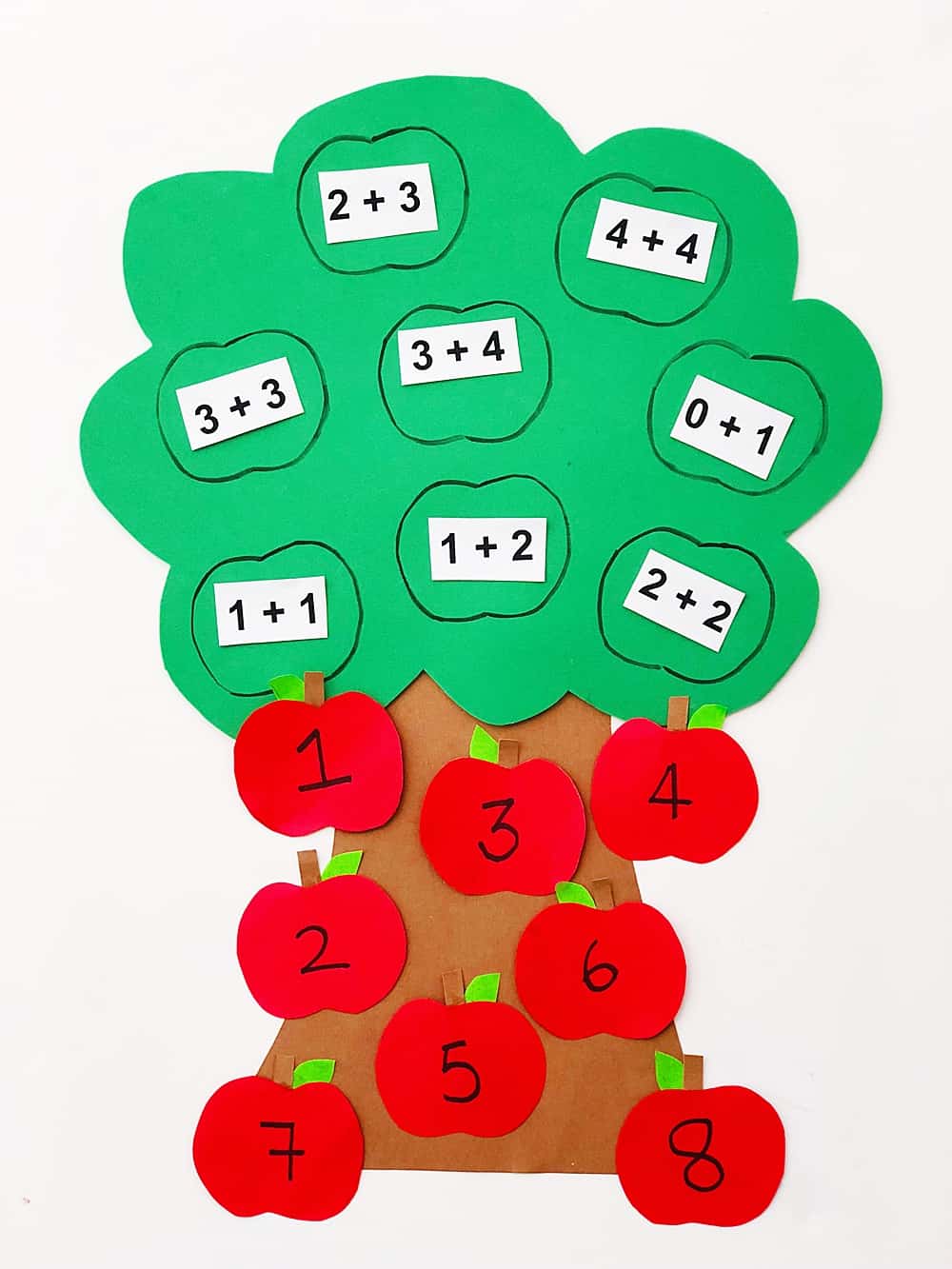 Quickly make this DIY apple math tree learning tool to help make math a game for your kids!