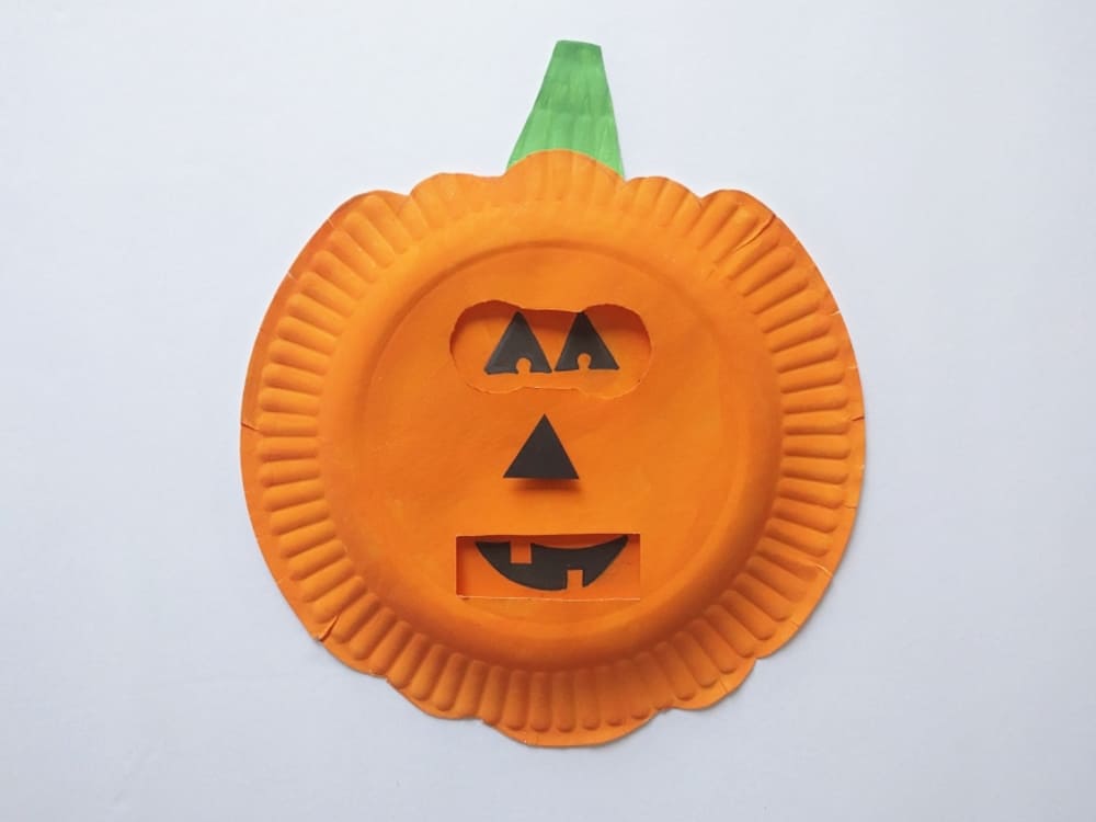 Help kids explore emotions using this simple shapes of jack-o-lantern faces with this fun seaosnal pumpkins emotion craft!