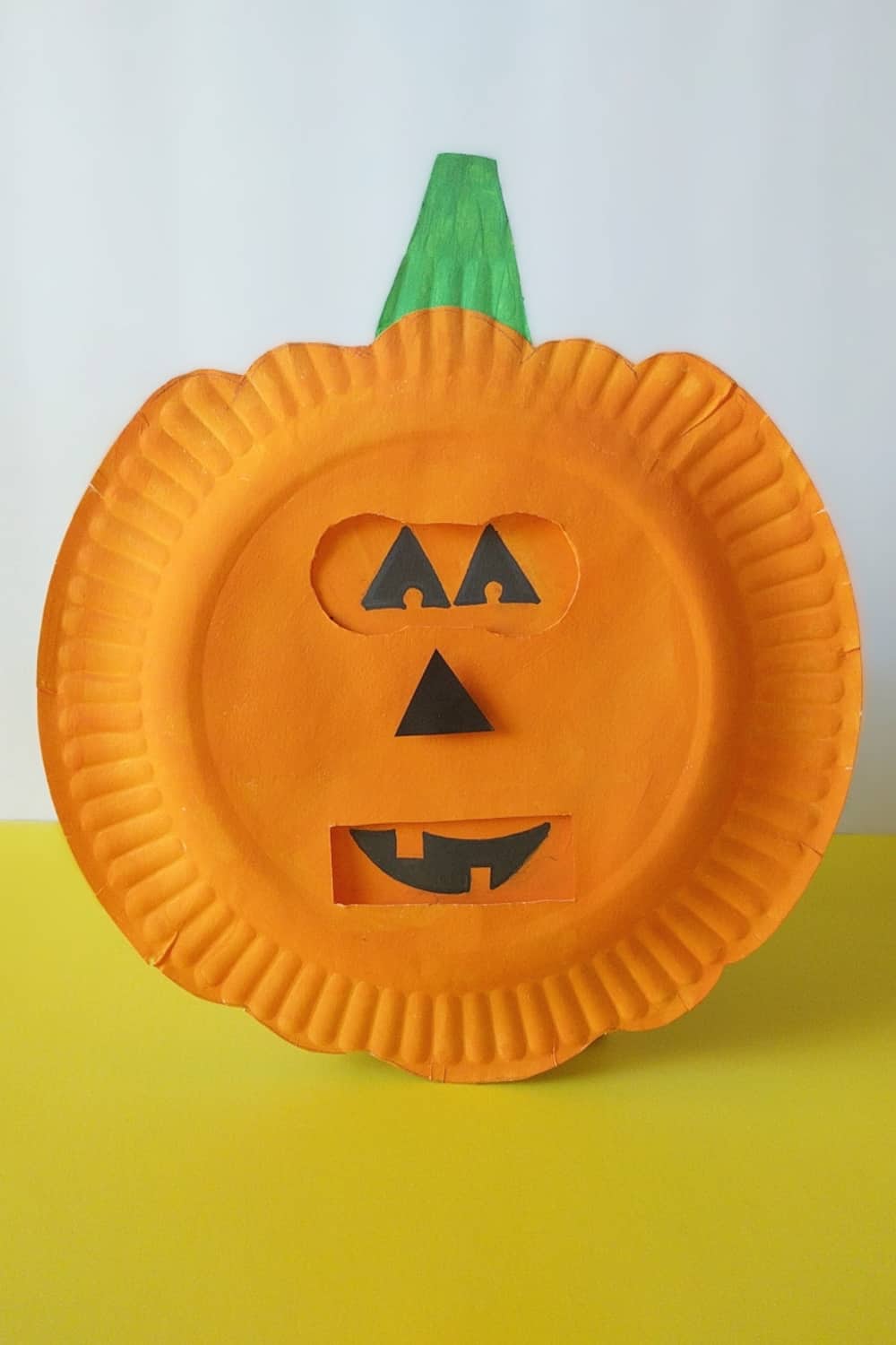 Help kids explore emotions using this simple shapes of jack-o-lantern faces with this fun seaosnal pumpkins emotion craft!