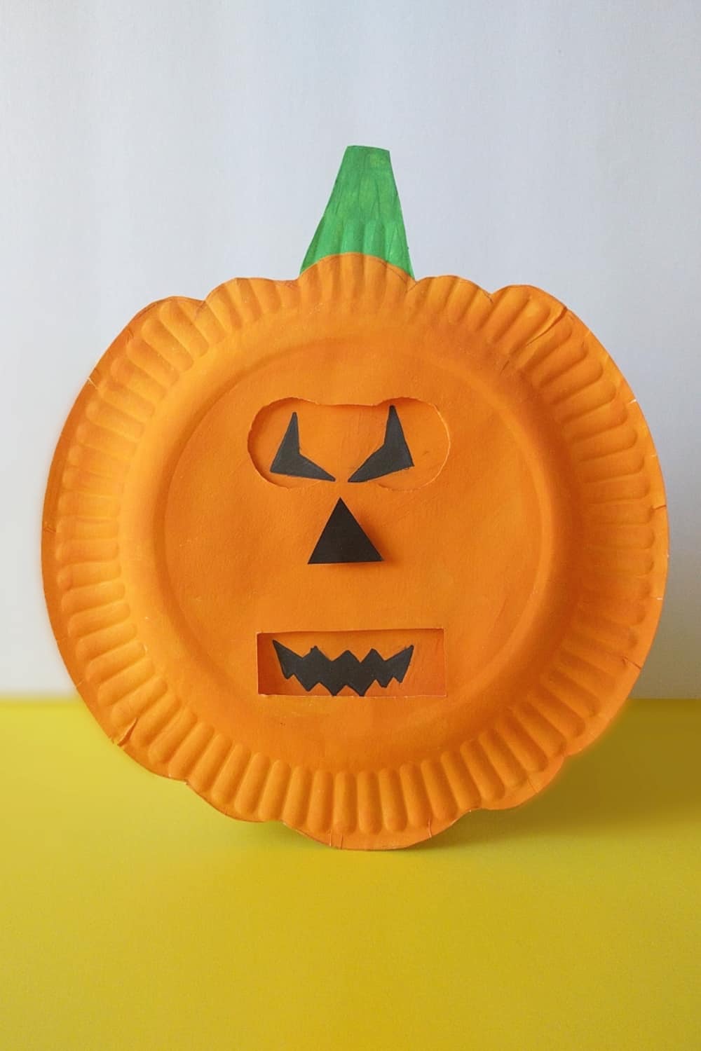 Help kids explore emotions using this simple shapes of jack-o-lantern faces with this fun seaosnal pumpkins emotion craft!