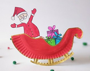 Make a rocking Santa sleigh out of a paper plate! A cute holiday craft for kids via hello, Wonderful.