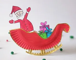 Make a rocking Santa sleigh out of a paper plate! A cute holiday craft for kids via hello, Wonderful.