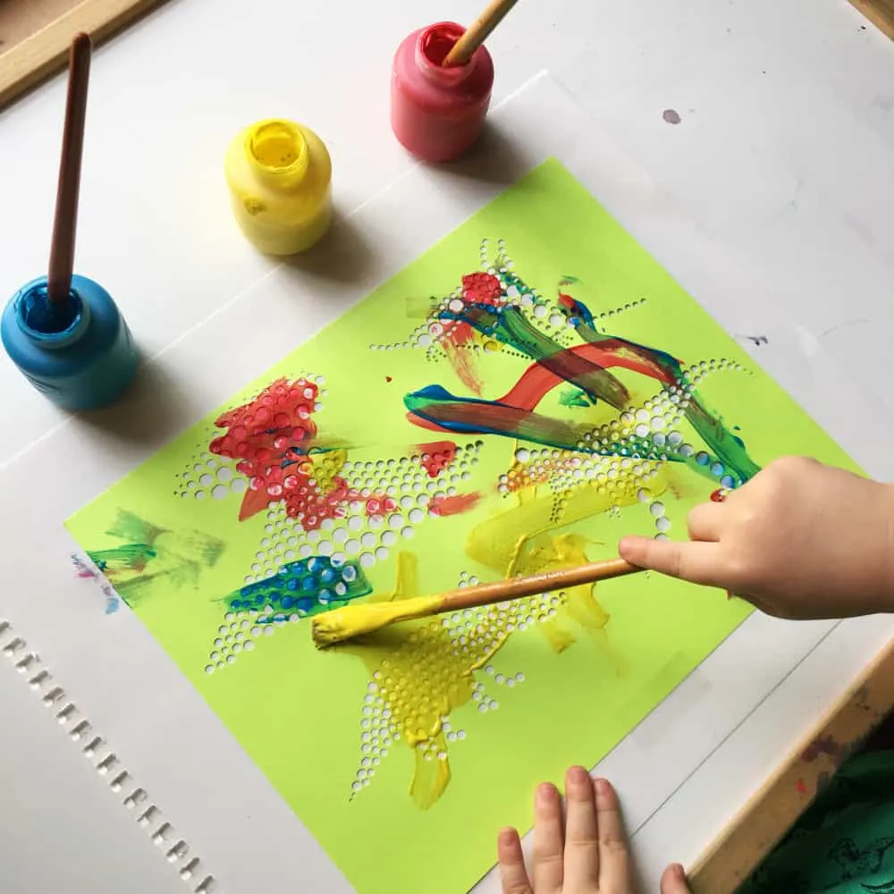 Create fun dinosaur pointillism art with a free template!