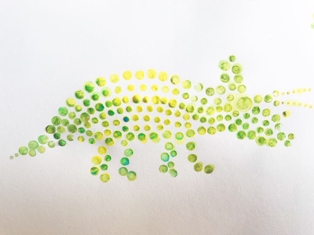 Create fun dinosaur pointillism art with a free template!