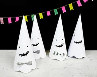 Cute Halloween paper cone ghosts (free template included).