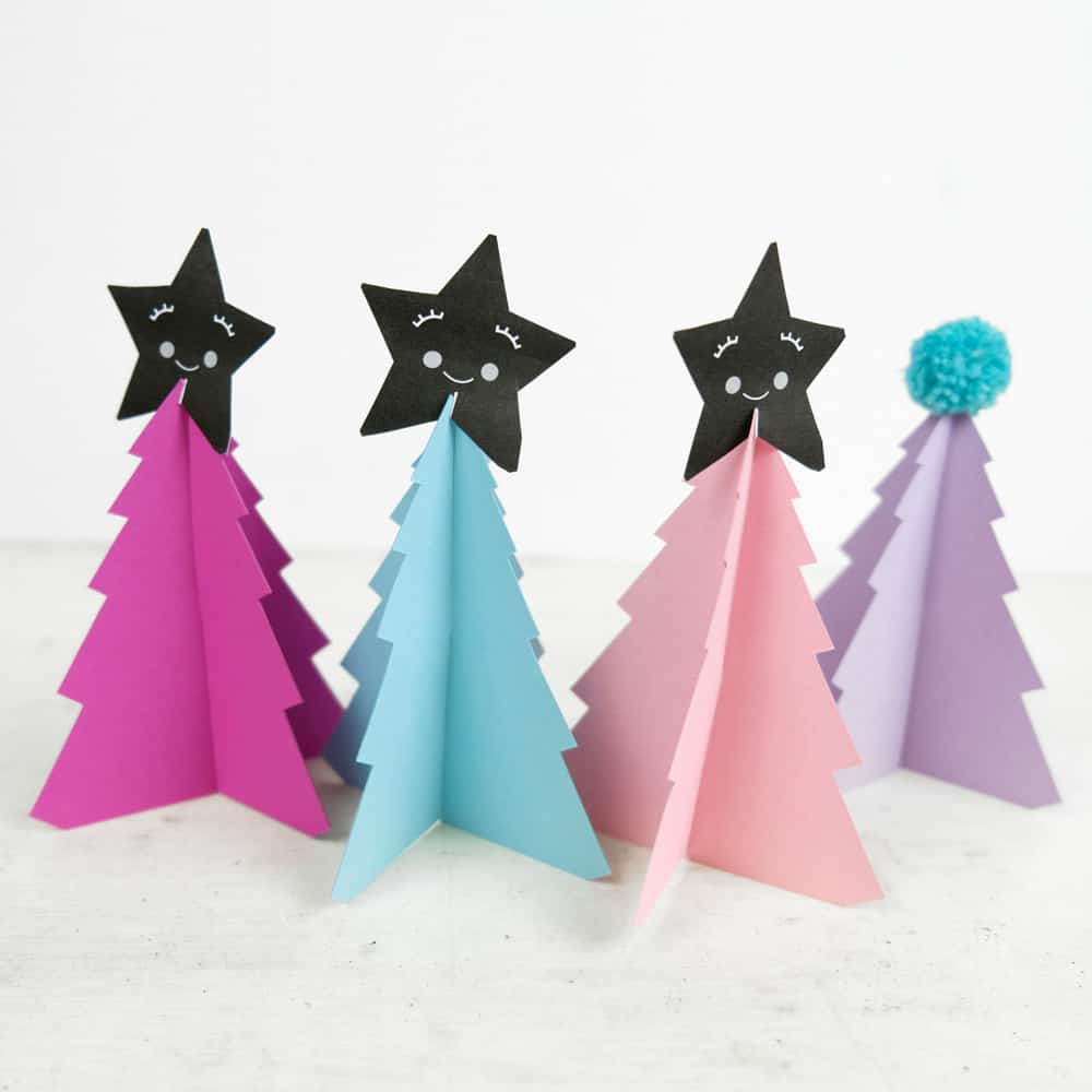 Create your own holiday countdown and use colorful pom poms to decorate these bright trees paper trees (free template included). 