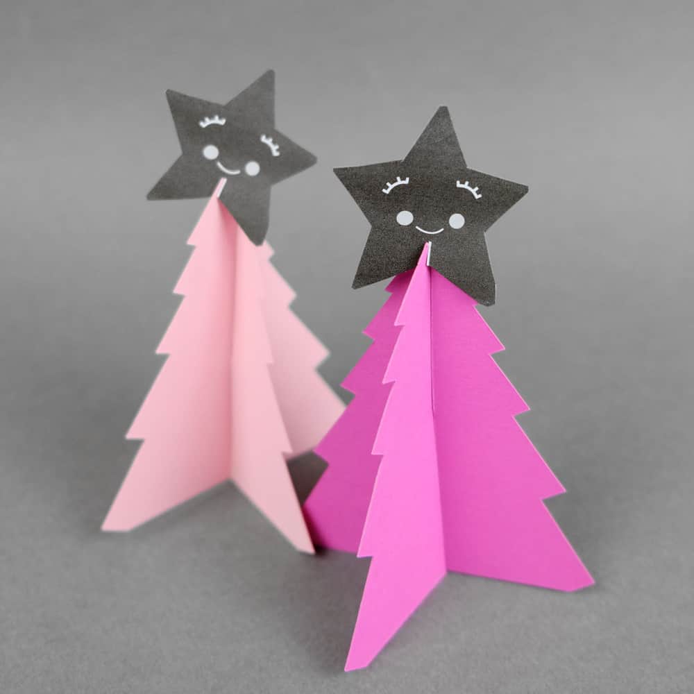 Create your own holiday countdown and use colorful pom poms to decorate these bright trees paper trees (free template included). 