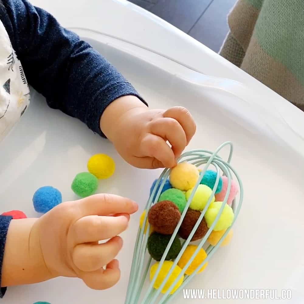 Kitchen Whisk Pom Pom sensory activity