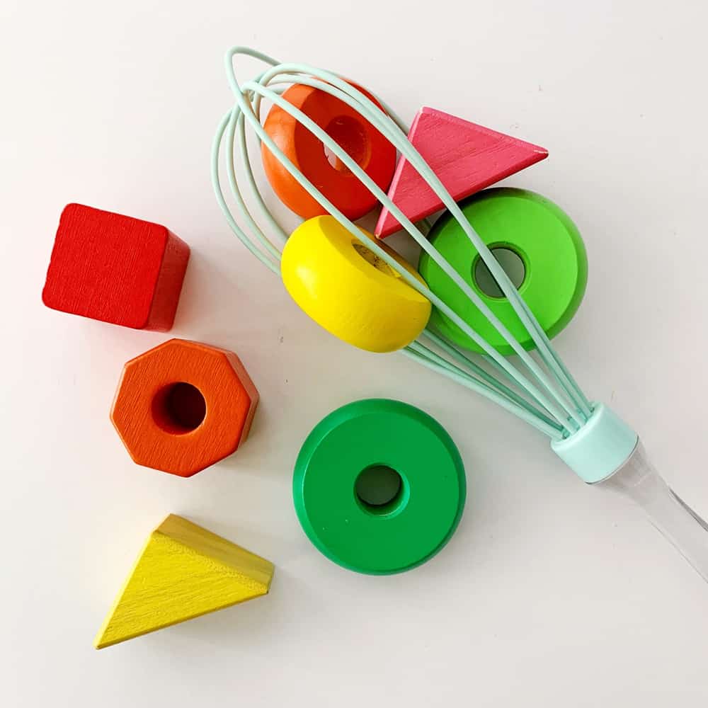 Blocks and whisk baby fine motor skills sensory activity. 