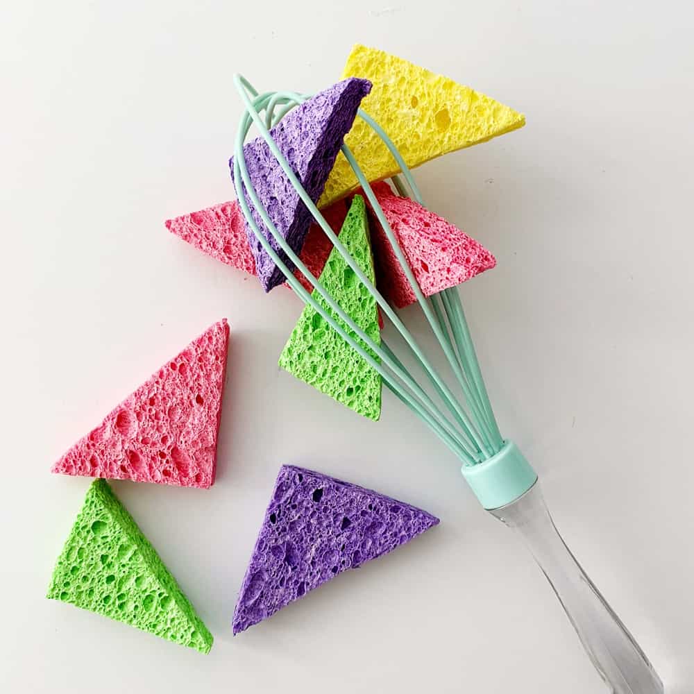 Sponge and whisk baby fine motor skills sensory activity. 