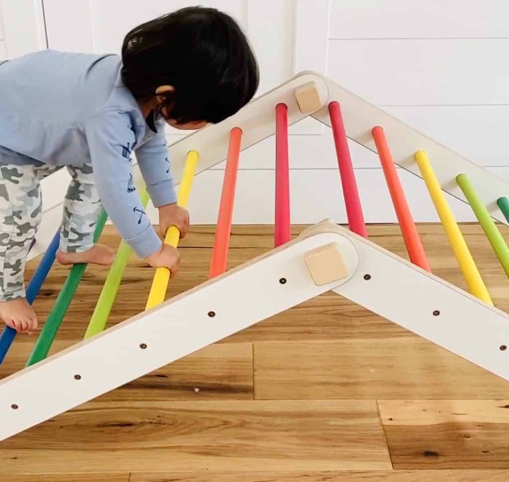 Rainbow Pikler Triangle. Gross motor skills for toddlers and preschoolers. 