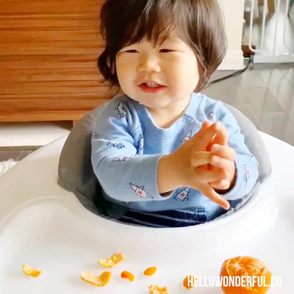 peeling oranges fine motor skills activity for babies or toddlers