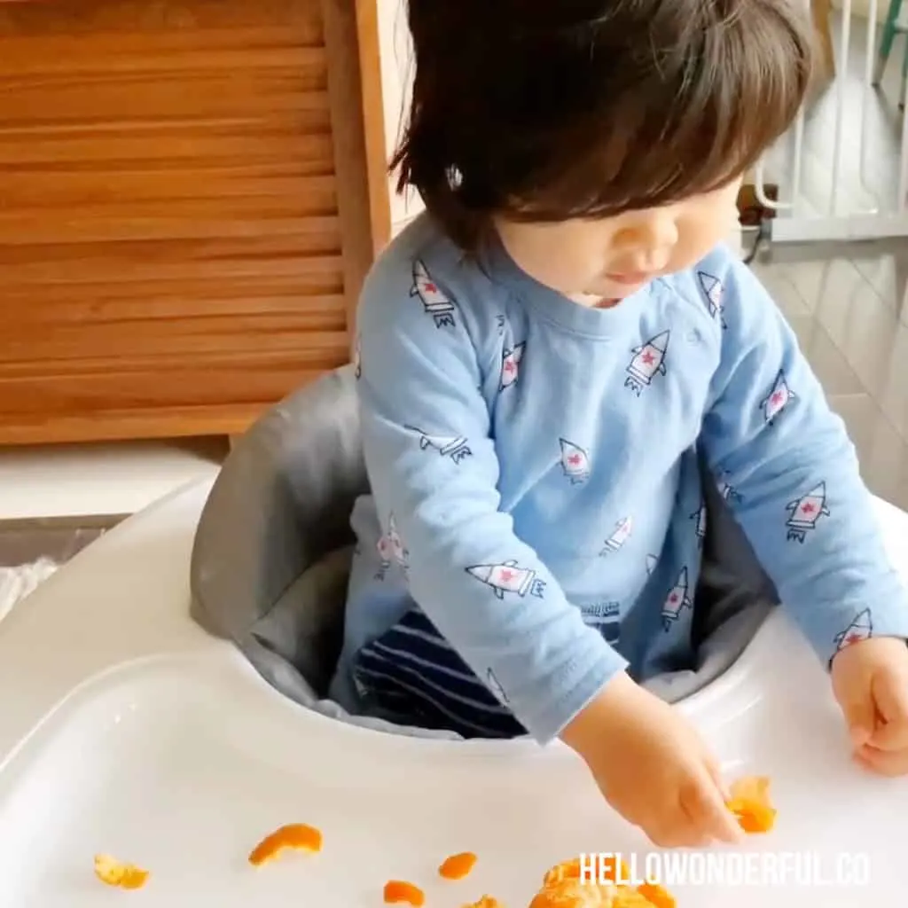 peeling oranges fine motor skills activity for babies or toddlers