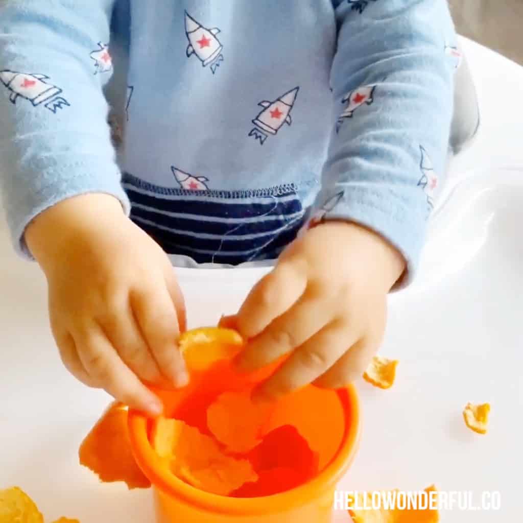 peeling oranges fine motor skills activity for babies or toddlers