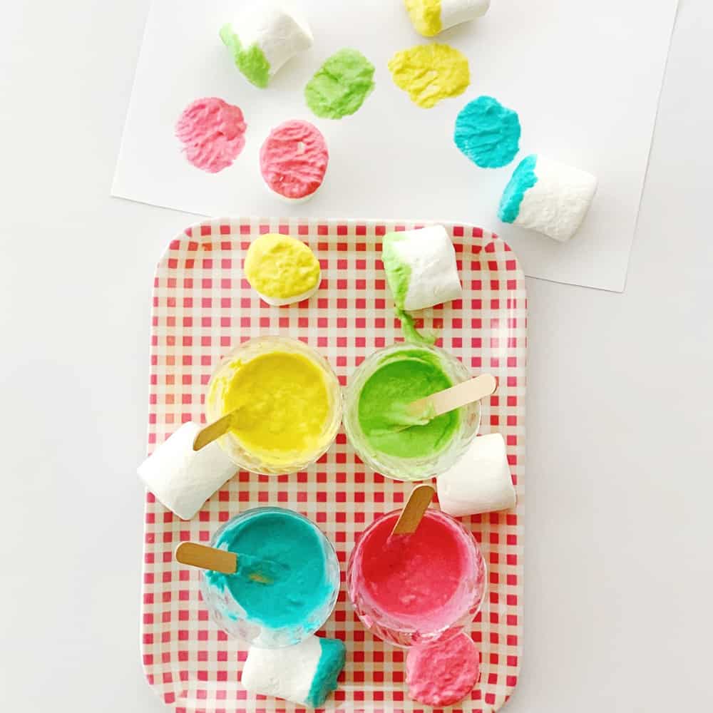 Set up this easy marshmallow stamping with taste safe edible paint. A fun baby or toddler painting activity.