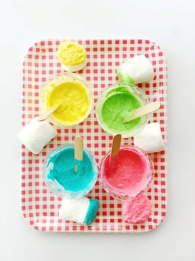 Set up this easy marshmallow stamping with taste safe edible paint. A fun baby or toddler painting activity.