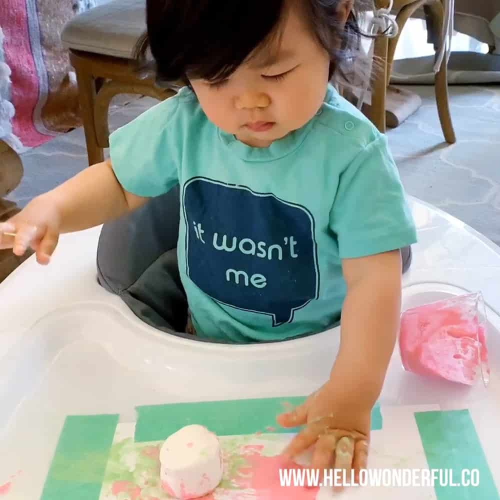 Set up this easy marshmallow stamping with taste safe edible paint. A fun baby or toddler painting activity.