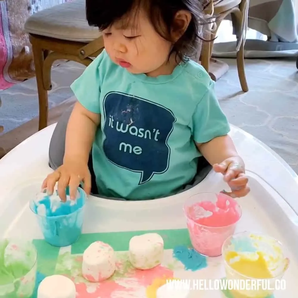 Set up this easy marshmallow stamping with taste safe edible paint. A fun baby or toddler painting activity.